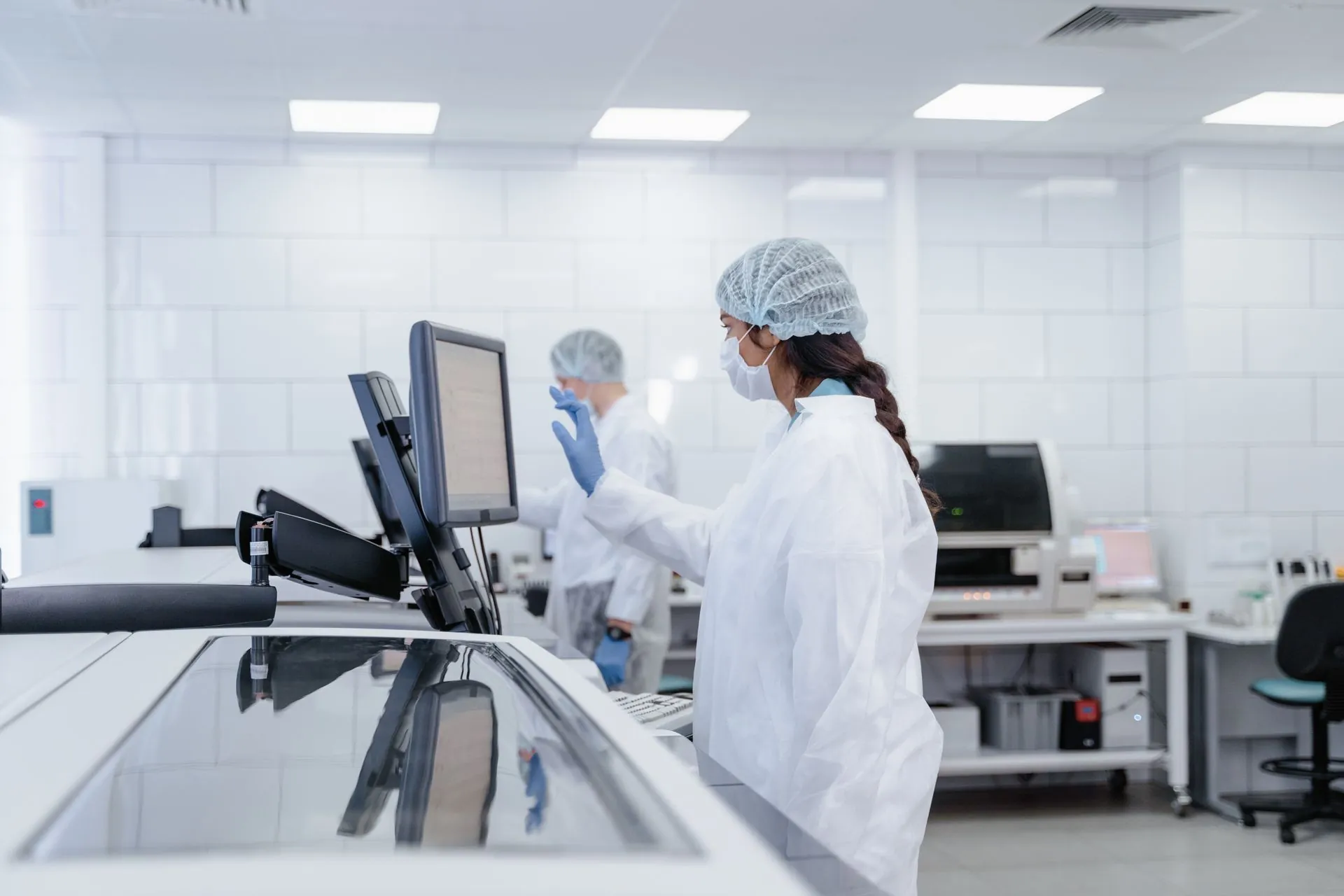 Technicians at work in a clean laboratory